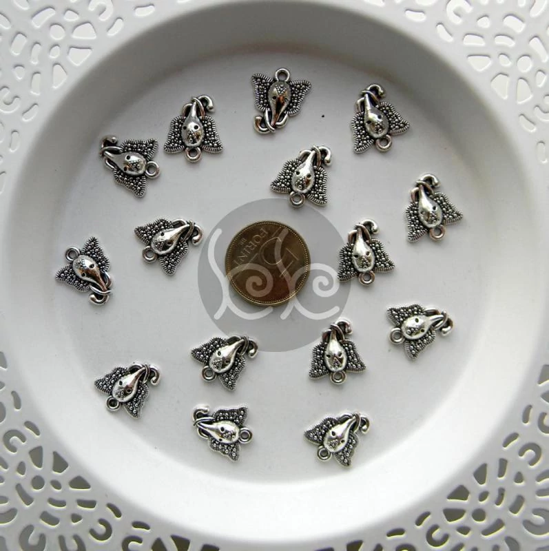 Ezüst elefánt fej medál 14x15 mm