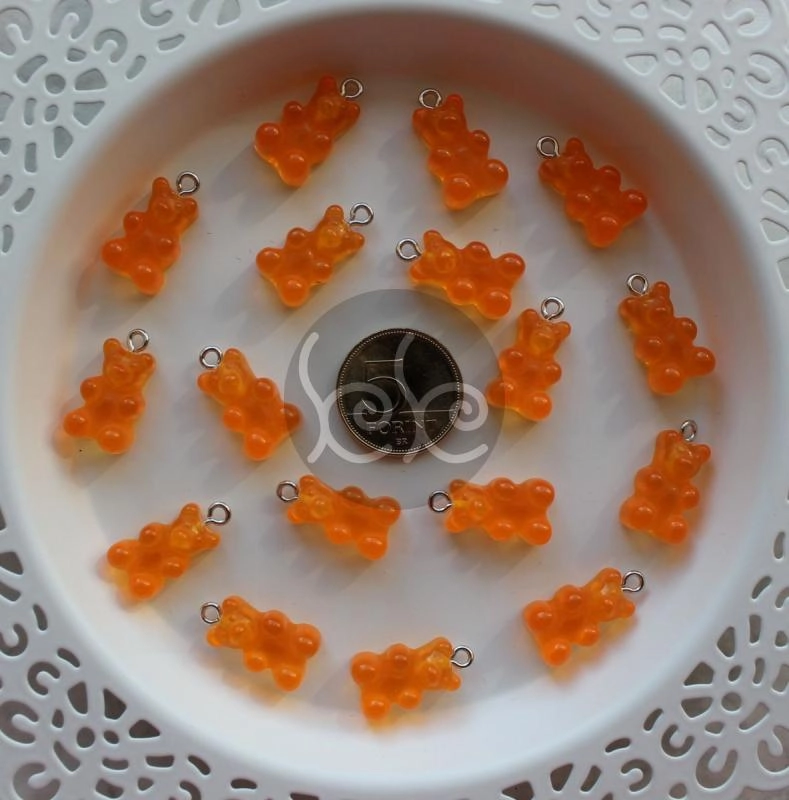 Áttetsző narancs műanyag gumimaci medál 11x21 mm (2 db)